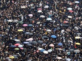 [NEWS] ‘Sea of black’ Hong Kong protesters demand leader step down – Loganspace AI